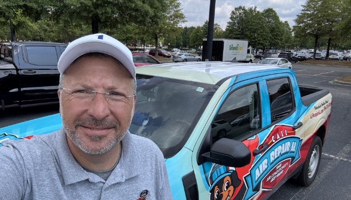 Don Posing With Air Repair Al Truck